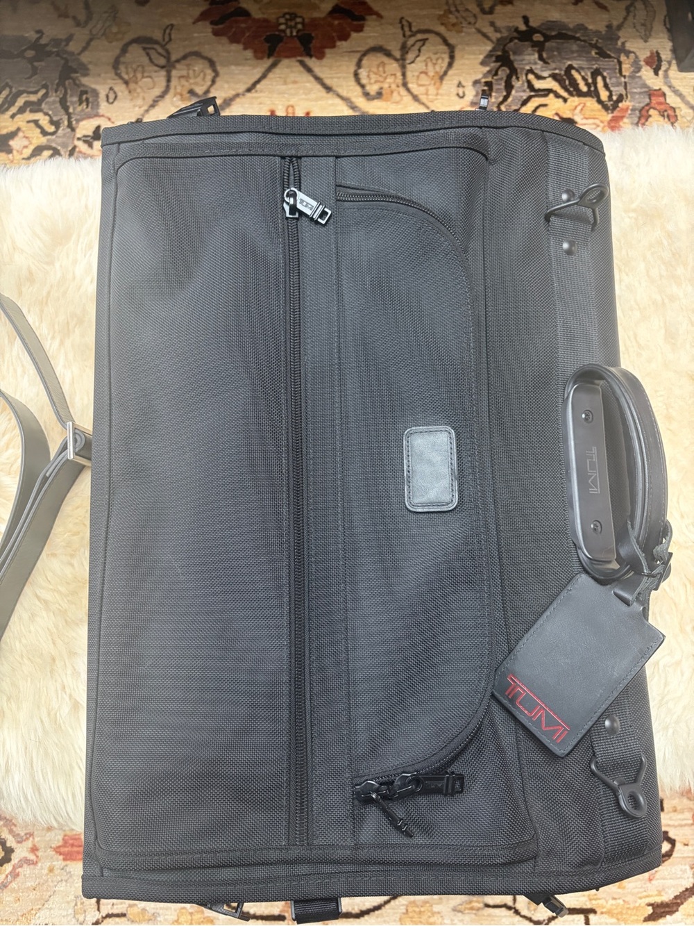 Tumi Black Rolling Travel Duffel with Red Logo Tag